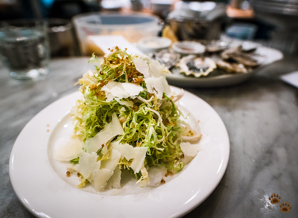 Frisee salad with anchovy cream, crispy quinoa and pecorino - The Walrus and The Carpenter, Seattle, Washington